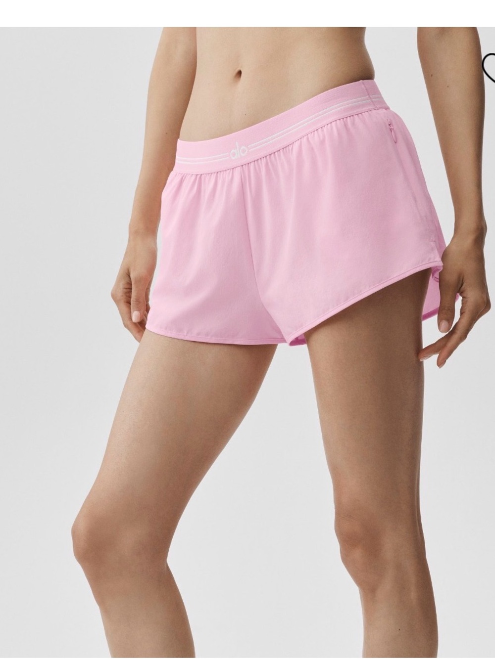 ALO Yoga full stride micro running shorts in pink marshmallow